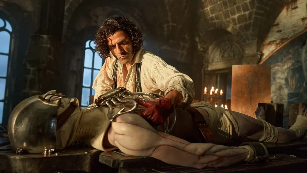 Oscar Isaac como Victor Frankenstein reanimando al monstruo interpretado por Jacob Elordi